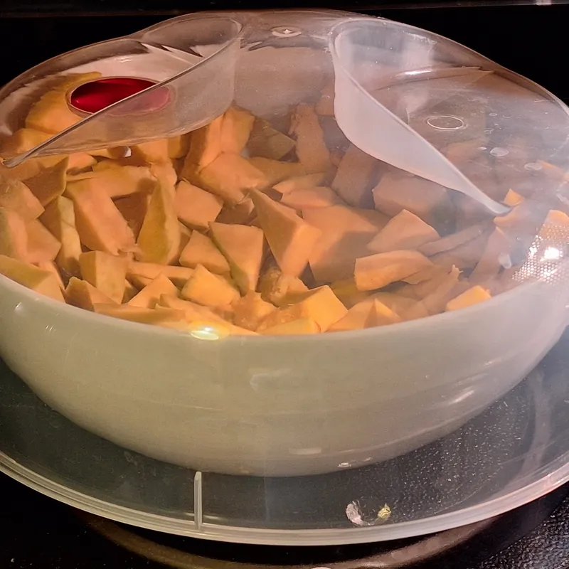 Cooking the pumpkin in the microwave in a covered container.