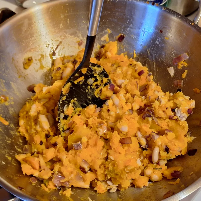The finished mixture, thick enough to hold up the spoon.