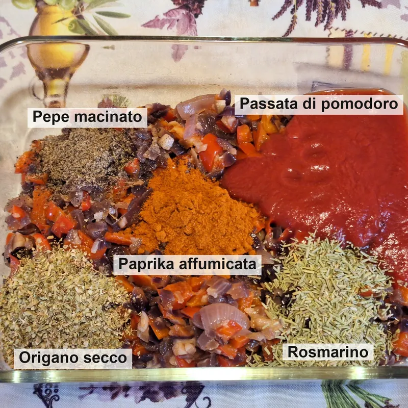 Aggiunta di pomodoro, spezie e aromi